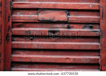 Rusty painted red iron wall texture background. Abstract wallpaper. Perfect texture for the interior exterior any possible industrial grunge background. Close up