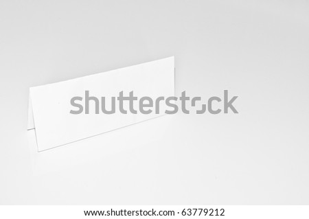Sheet of paper standing on white background
