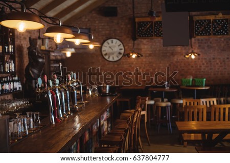 Empty bar counter at pub Royalty-Free Stock Photo #637804777