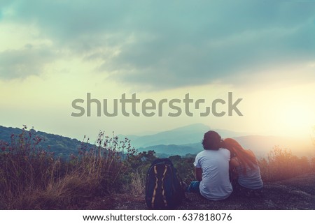 Natural background Couples lovers. The sun rises in the morning on the mountain.  thailand doi inthanon Royalty-Free Stock Photo #637818076