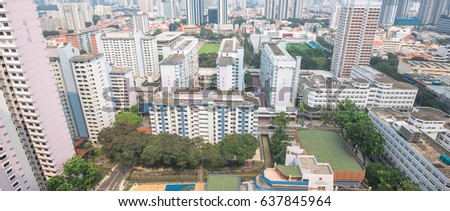 Panoramic, aerial view of new estate HDB housing complex neighborhood in Singapore at midday. Urban concept