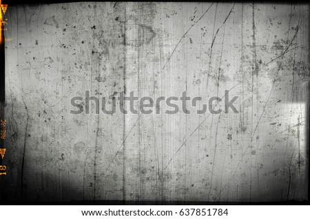 Blank grained and scratched film strip texture background Royalty-Free Stock Photo #637851784