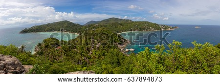 Panoramic picture of two sides of ocean separated by island. This picture was captured from John-Suwan Viewpoint, Koh Tao, southern of Thailand. 
