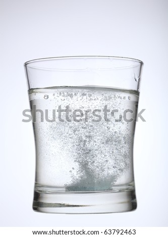 Aspirin in water glass