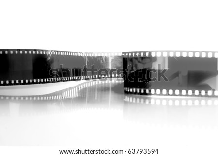 black and white Film strip in front of a white background .