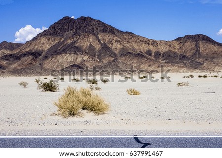 One of the roads that crosses Death Valley National Park, a desert valley located in Eastern California and one of the hottest places in the world.