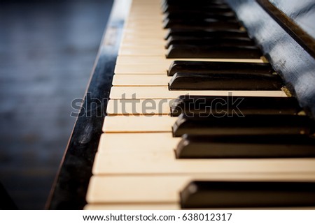 Keyboard piano close up photo, soft focus. Beautiful close up photo of piano keys.Piano keys close up photo selective focus.Piano keyboard close up side view, stock photo