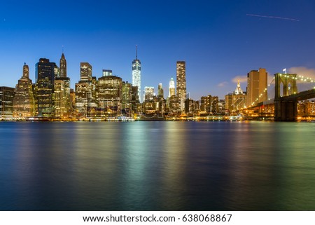 Panorama of Brooklyn Bridge and Lower Manhattan by night