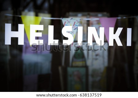 Helsinki sign in store window in the Finnish capital