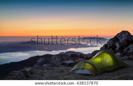 Camping in the mountain at sunset camp