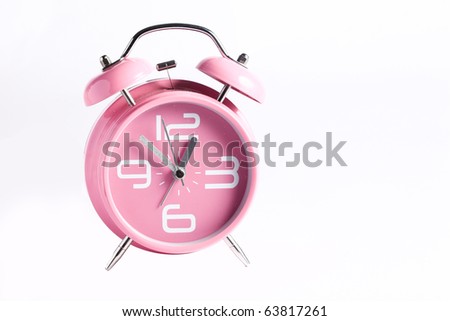 Pink alarm clock Royalty-Free Stock Photo #63817261
