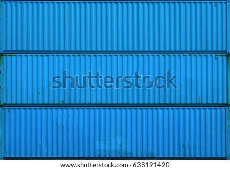 The blue blank surface texture of the sea container. Three stacked containers without labels. Royalty-Free Stock Photo #638191420