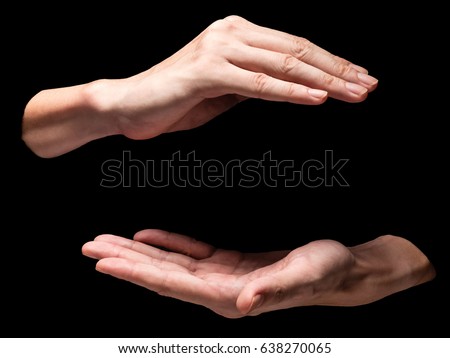 Male hands on a black background. Royalty-Free Stock Photo #638270065