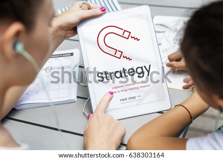 Women working on digital device network graphic overlay