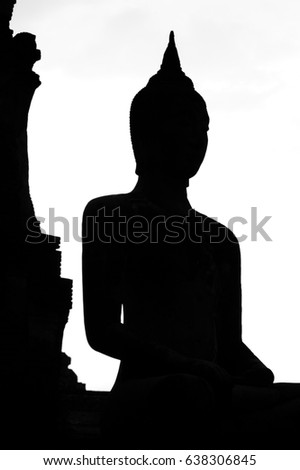 the  silhouette of Buddha statue
