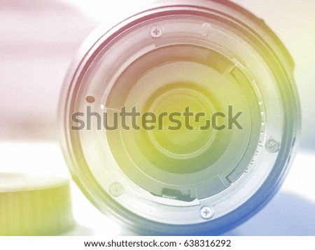 Selected focus on a camera lens with pastel tone decoration