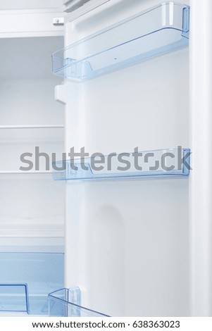 New white refrigerator isolated on white background