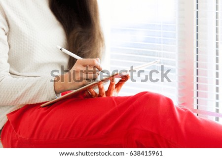 Woman Using Digital Tablet