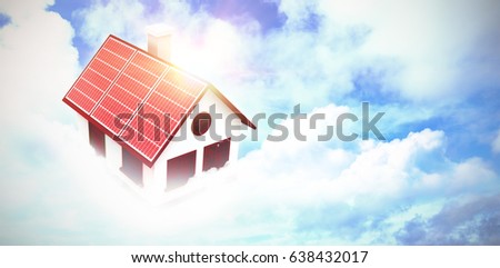 Digital composite of 3d house in blue sky