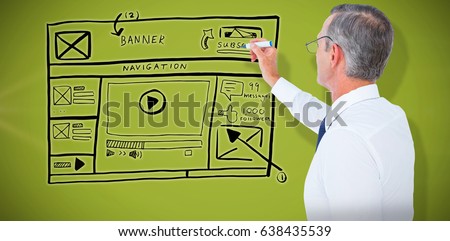 Businessman writing with black marker against green background