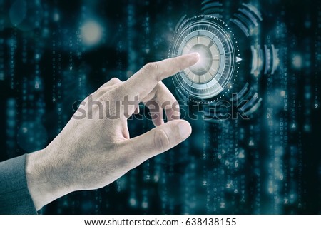 Cropped hand of businessman touching digital screen against digital composite of volume knob with graphs