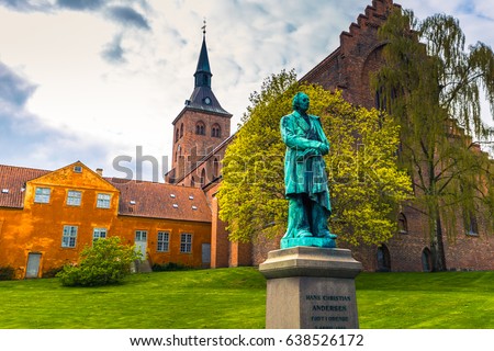 Cathedral of Saint Canute and Statue of Hans C Andersen in Odense, Denmark Royalty-Free Stock Photo #638526172