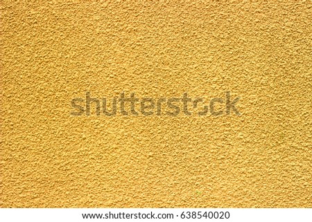 Gold concrete wall barrier old plaster granite pattern
