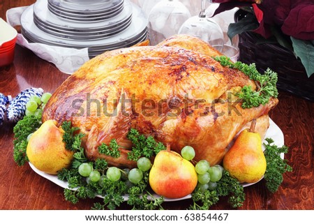 Christmas turkey dinner with fresh pears, grapes and parsley.