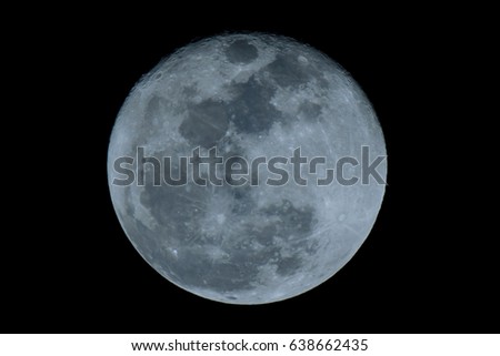 The moon shines in the dark see details on the surface is rough like bumpy near gas group cover inside in grey picture feel cold uncertain what is there within moon would prove to know for benefit
