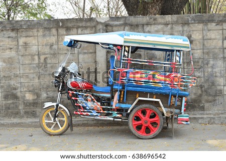Tricycle Royalty-Free Stock Photo #638696542