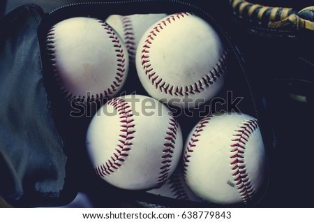 Baseballs in a bag for retro sports background.  Shows closeup of equipment, including balls to play with.