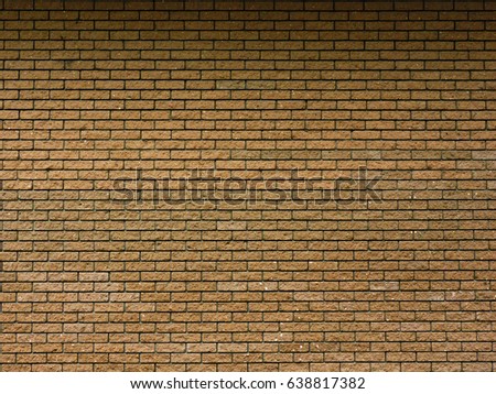brown brick wall texture grunge background with vignetted corners, may use to interior design
