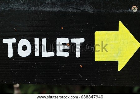 Symbolize arrow pointing go to way toilet