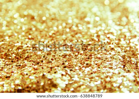 Gold glitter sparkle background,Material glitter texture background