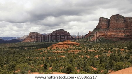 Arizona desert landscape with red rock mountains in background