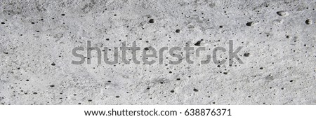 grey concrete wall.Panorama bubbles concrete background