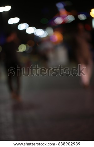 dubai street photography, people walk and traffic blur images good for background.