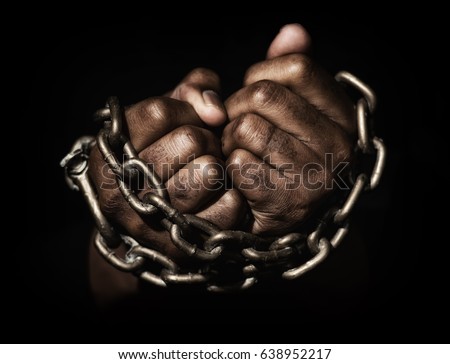 Hands in chains Royalty-Free Stock Photo #638952217