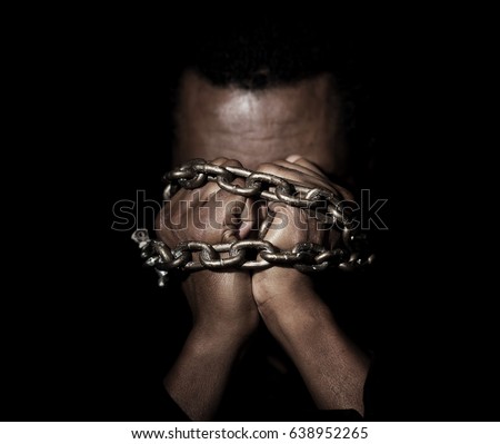 Black Man In Chains Royalty-Free Stock Photo #638952265