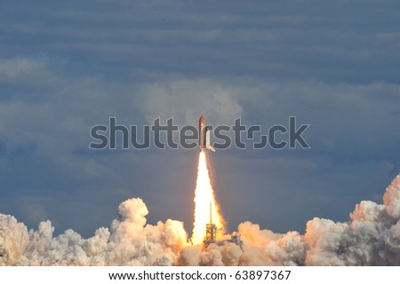 Space Shuttle Atlantis launches from the Kennedy Space Center Royalty-Free Stock Photo #63897367