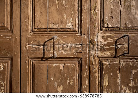 Old rusty wooden door. Close up shot.