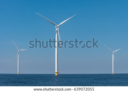 Windmill park Westermeerwind the largest wind farm offshore and on land in theNetherlands.The wind farm produce 1.4 TWh of electricity, enough electricity to over 400,000 households.Urk,Netherlands Royalty-Free Stock Photo #639072055