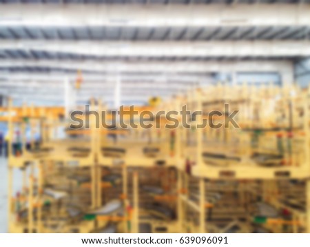 abstract blur :metal package storage inside factory