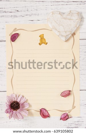 Flat lay stock photography flower letter paper purple flower petals wood heart craft