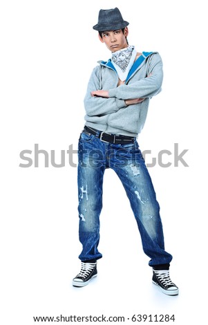 Shot of a dancing young man. Isolated over white background.