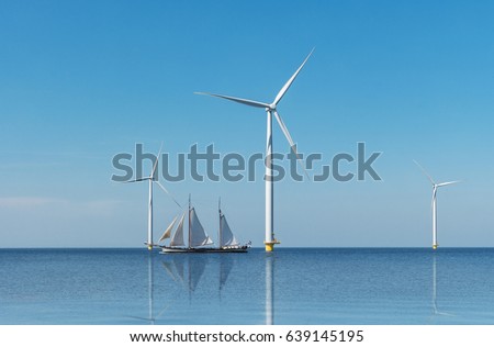 Windmill park Westermeerwind the largest wind farm offshore and on land in theNetherlands.The wind farm produce 1.4 TWh of electricity, enough electricity to over 400,000 households.Urk,Netherlands Royalty-Free Stock Photo #639145195