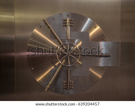 View of the door of a big vault Royalty-Free Stock Photo #639204457
