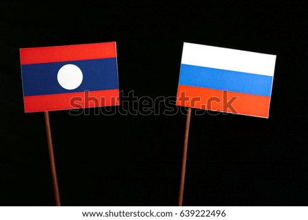 Laos flag with Russian flag isolated on black background