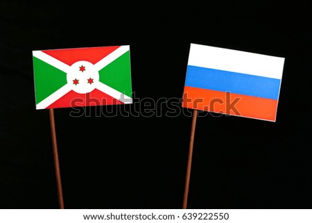 Burundi flag with Russian flag isolated on black background