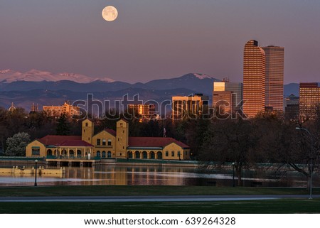 The full moon setting over Mt Evans with Denver City Park in the foreground
